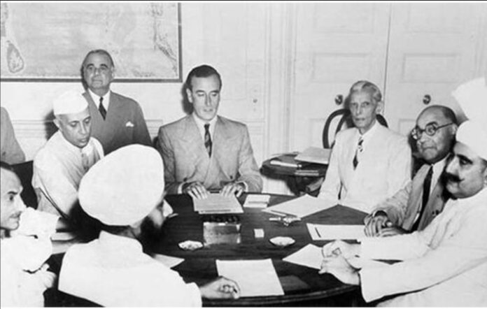 Lord Mountbatten, then viceroy of India, meets Nehru Jinnah and other leaders to plan partition of India. Wikipedia, CC BY-NC